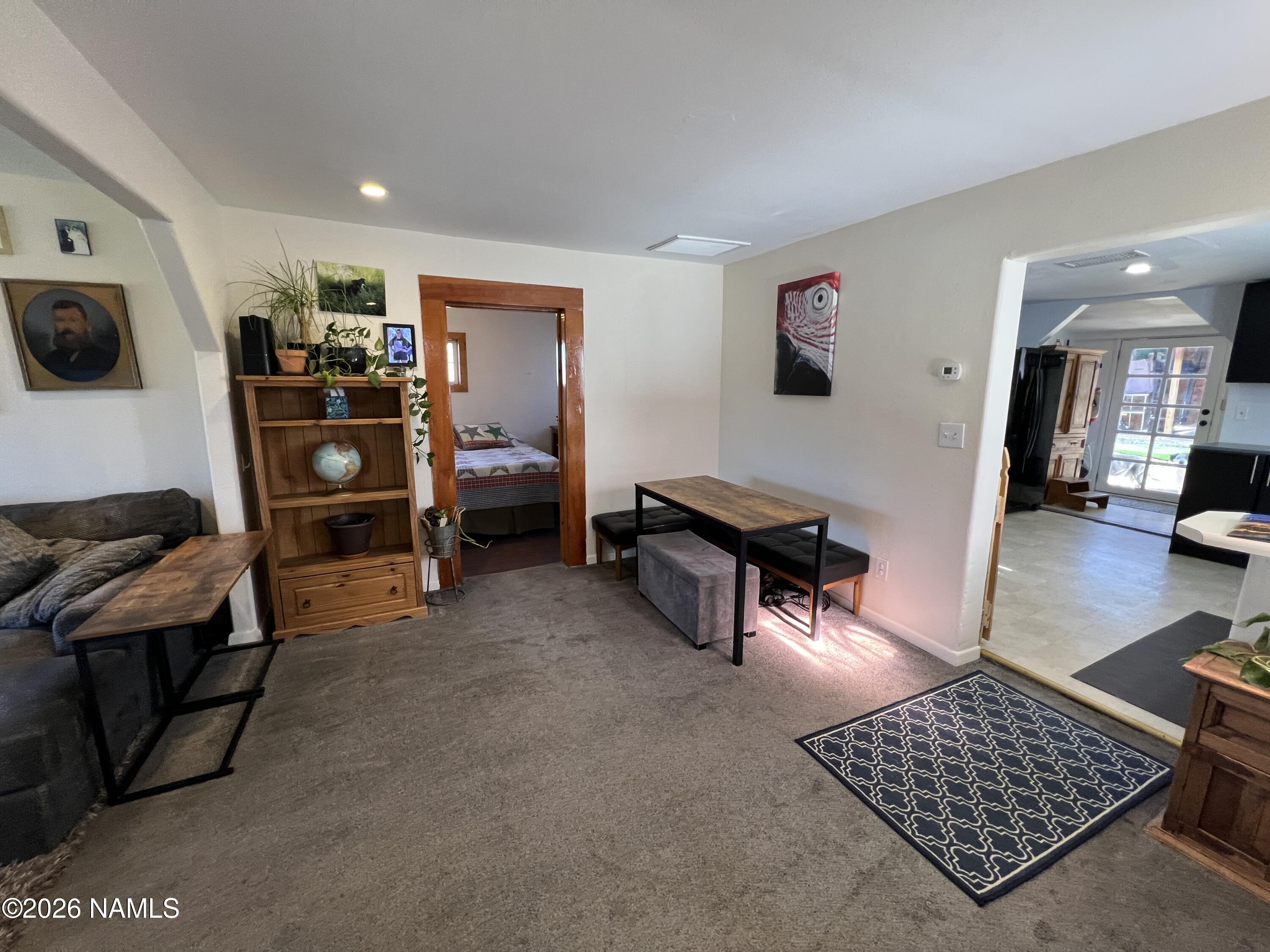 407 South 4th Street Williams, AZ 86046 - Photo 9 of 25 a living room with furniture and a flat screen tv