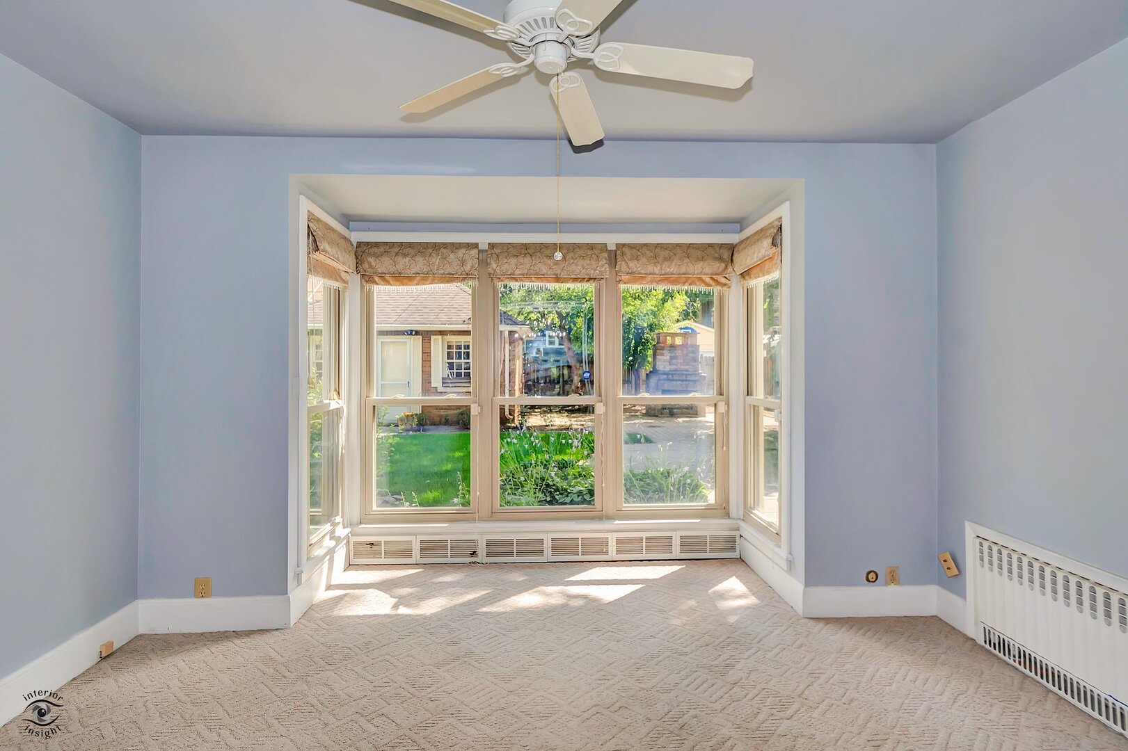 1096 South Wildwood Avenue Kankakee, IL 60901 - Photo 12 of 38 an empty room with a window