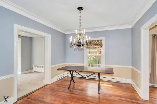 a view of a room with furniture window and wooden floor
