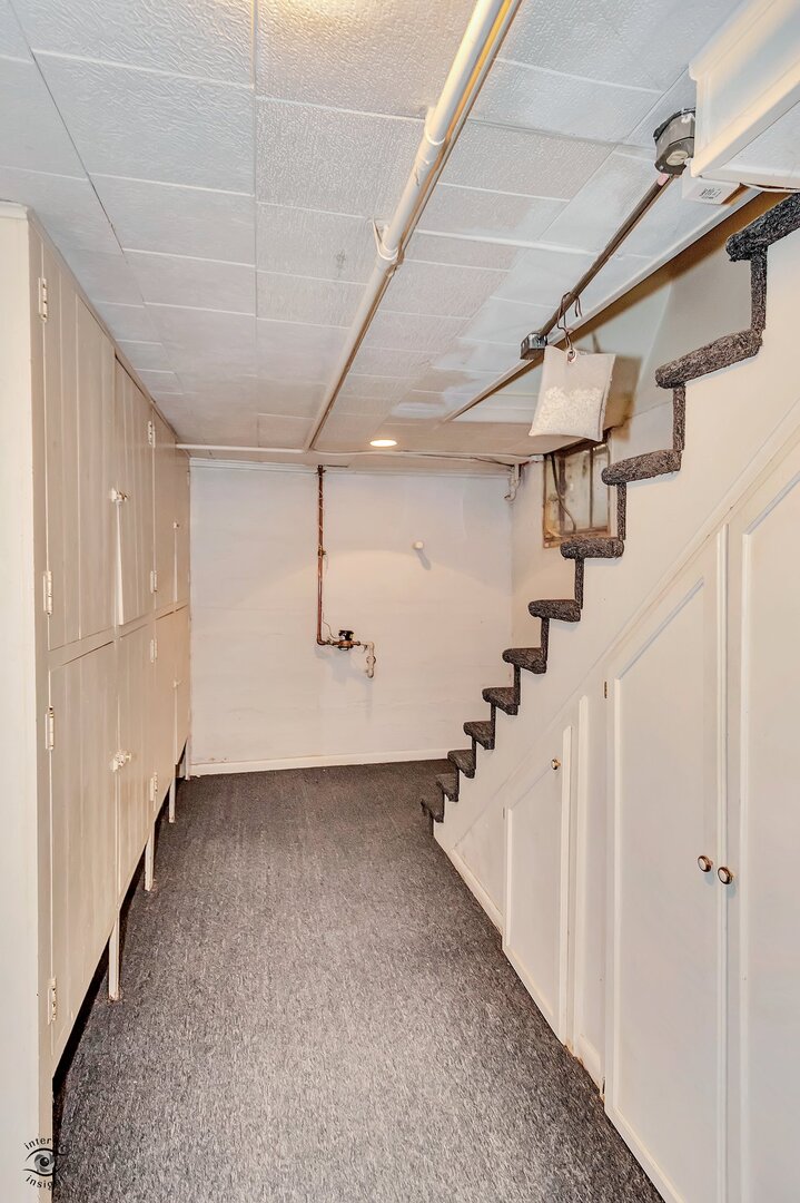 1096 South Wildwood Avenue Kankakee, IL 60901 - Photo 32 of 38 a view of a hallway with stairs
