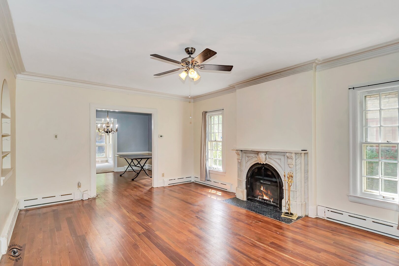 1096 South Wildwood Avenue Kankakee, IL 60901 - Photo 6 of 38 an empty room with fireplace and windows
