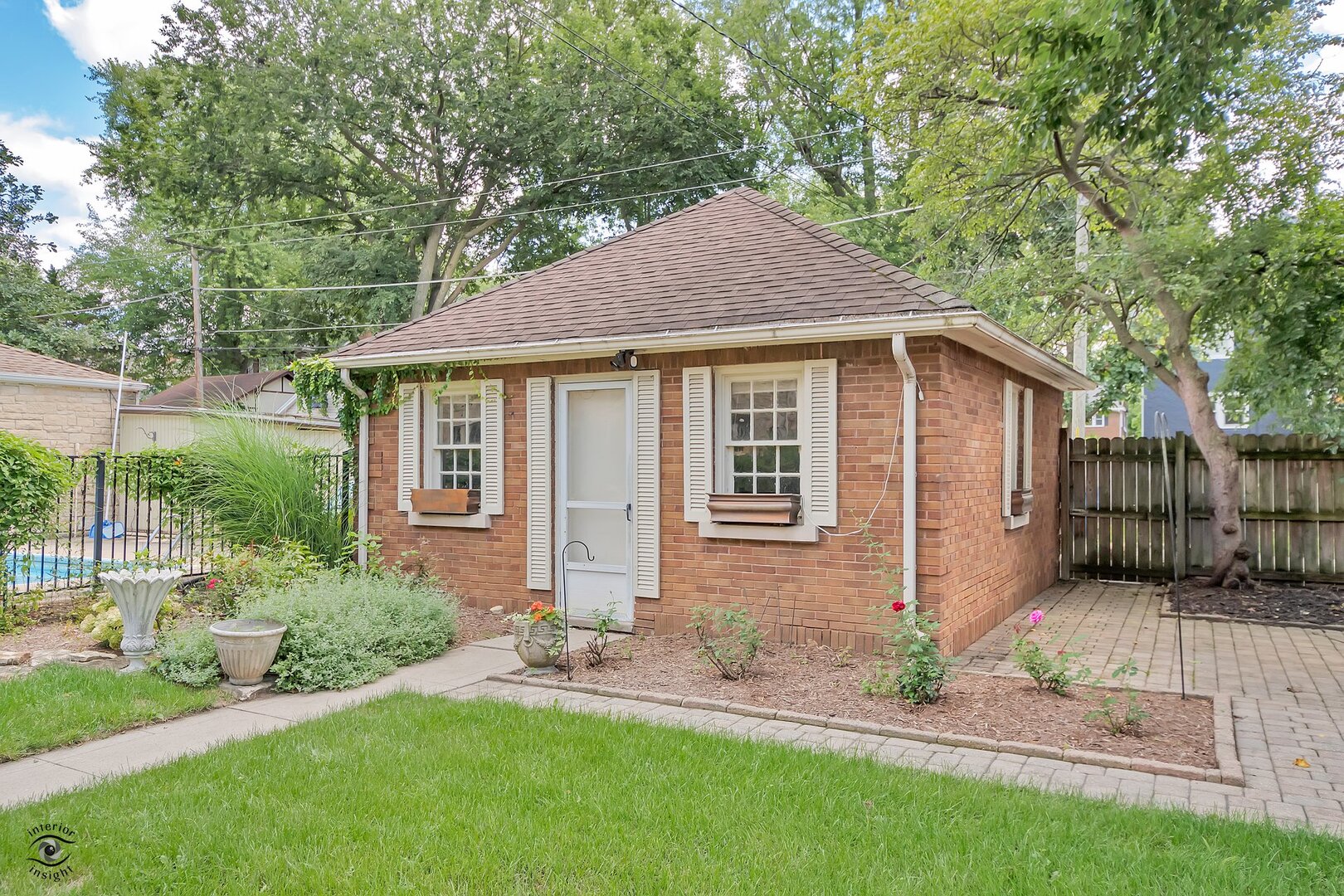 1096 South Wildwood Avenue Kankakee, IL 60901 - Photo 9 of 38 a front view of a house with garden