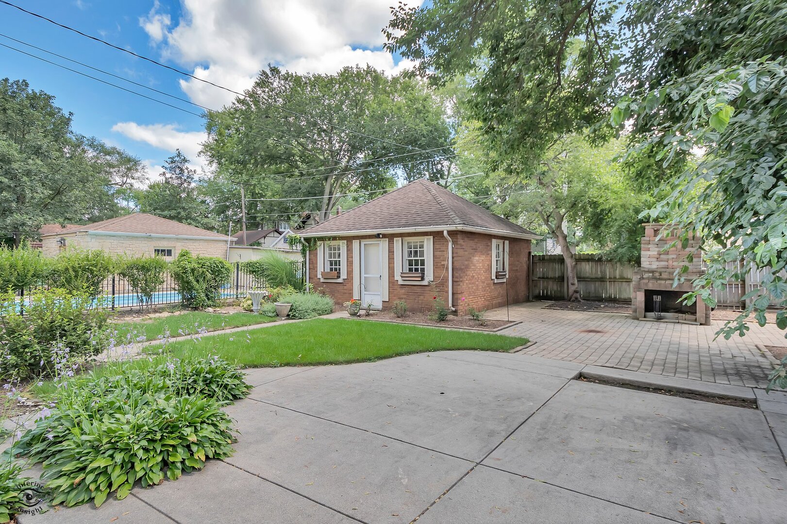 1096 South Wildwood Avenue Kankakee, IL 60901 - Photo 10 of 38 a front view of a house with a yard and garage