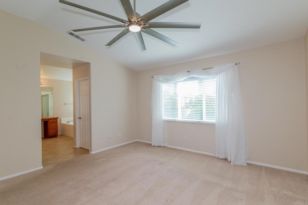 45160 Jumi Circle Temecula, CA 92592 - Photo 16 of 37 a view of an empty room with a window