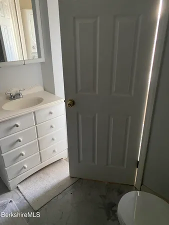 a bathroom with a toilet