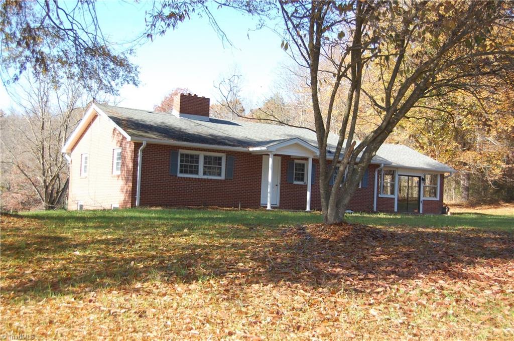 3224 Mining Ridge Church Road State Road, NC 28676 - Photo 1 of 26 MOVE IN READY WELL BUILT BRICK WITH FULL BASEMENT & ENCLOSED CAR PORT AREA