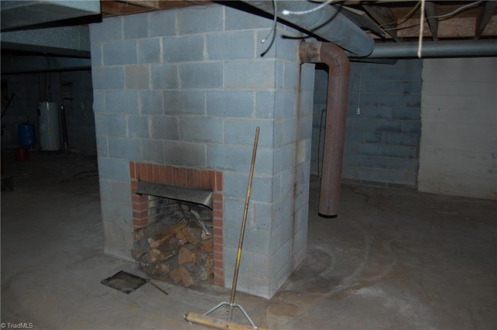 3224 Mining Ridge Church Road State Road, NC 28676 - Photo 25 of 26 FIREPLACE IN BASEMENT OR PLACE FOR YOUR WOOD STOVE