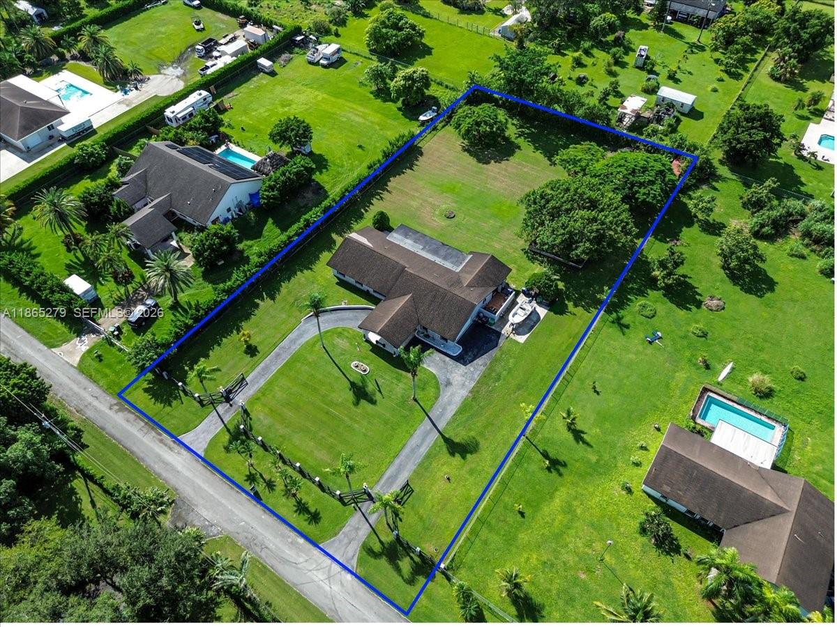 19926 Southwest 326th Street Homestead, FL 33030 - Photo 11 of 46 an aerial view of a yard