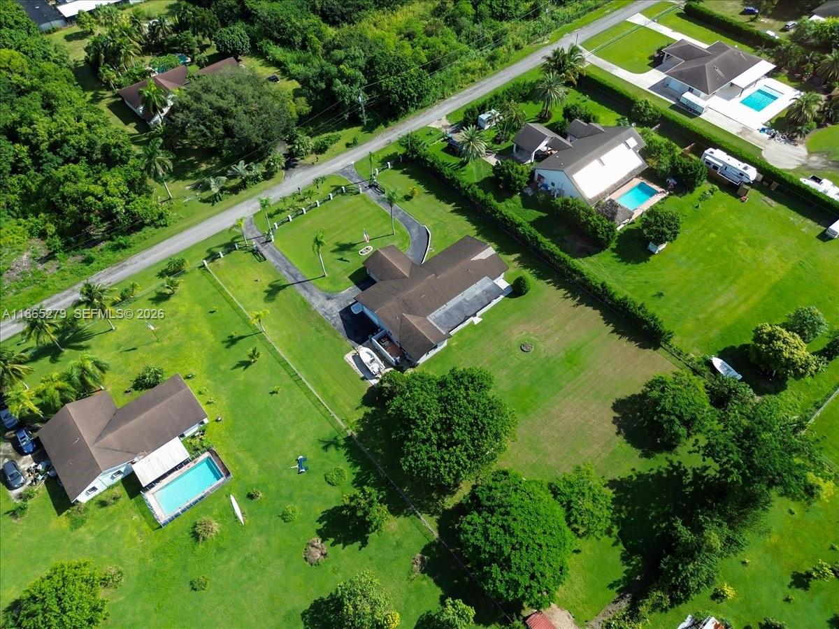 19926 Southwest 326th Street Homestead, FL 33030 - Photo 23 of 46 an aerial view of a house with a garden