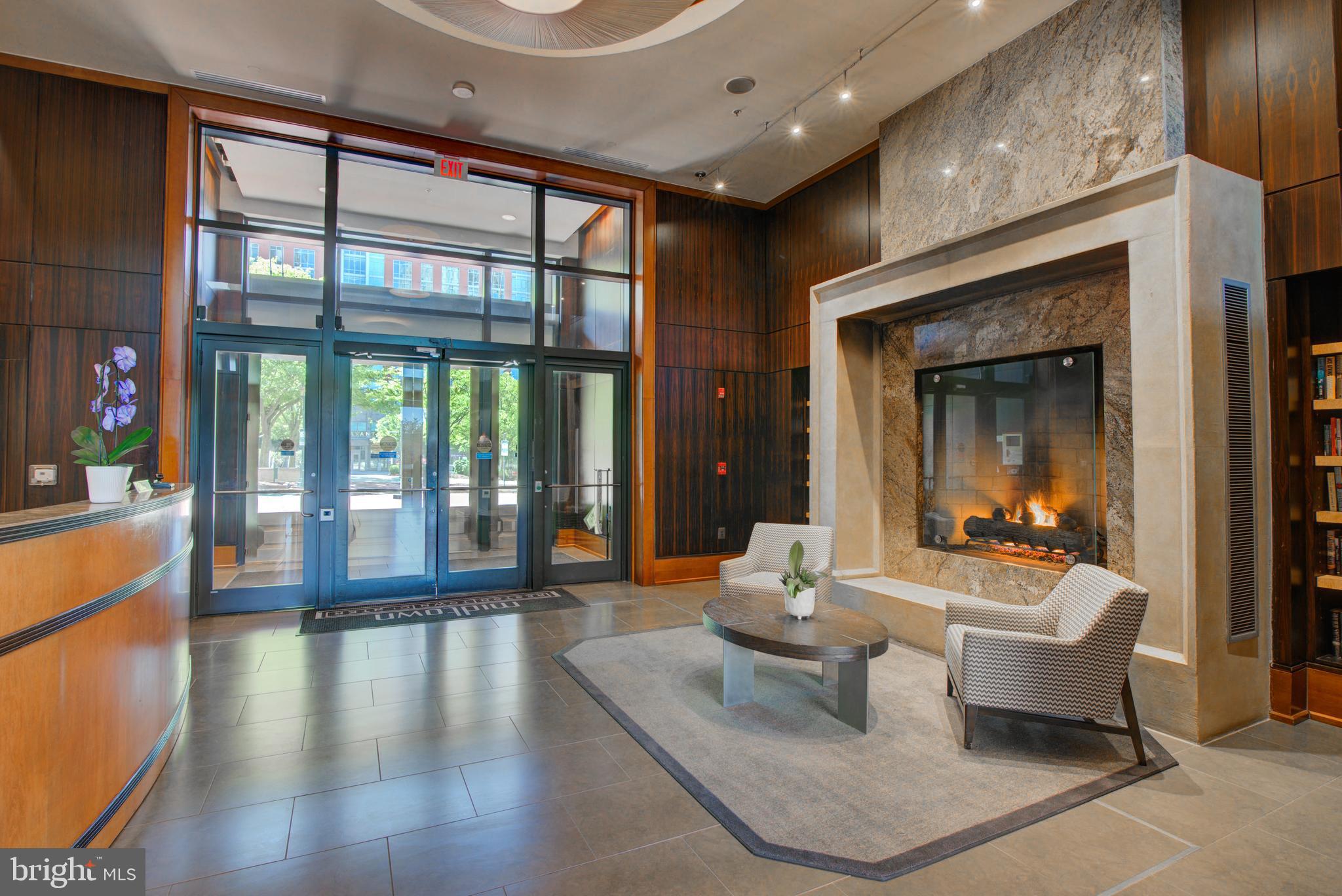 11990 Market Street, Unit 2101 Reston, VA 20190 - Photo 57 of 103 Building lobby w/24hr concierge