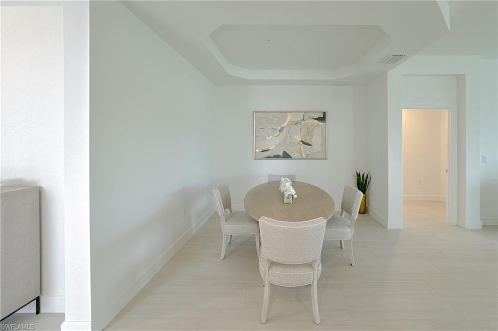 16881 Fairgrove Way, Unit 7102 Naples, FL 34110 - Photo 11 of 50 a white bath tub sitting next to a white toilet