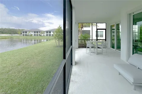 a view of a room with a large window