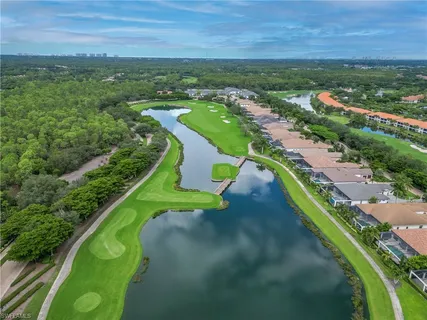 a view of a lake with a yard