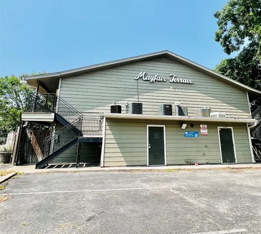 a view of a house with a garage