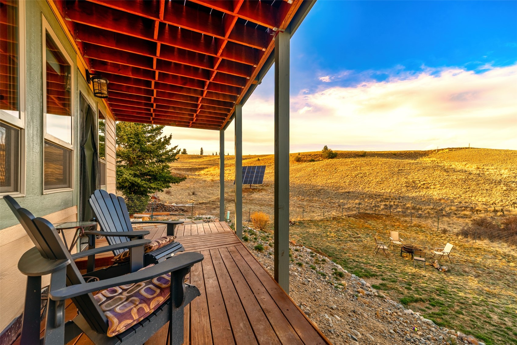 440 Arland Road Como, CO 80432 - Photo 41 of 49 a view of a balcony with wooden floor and outdoor space