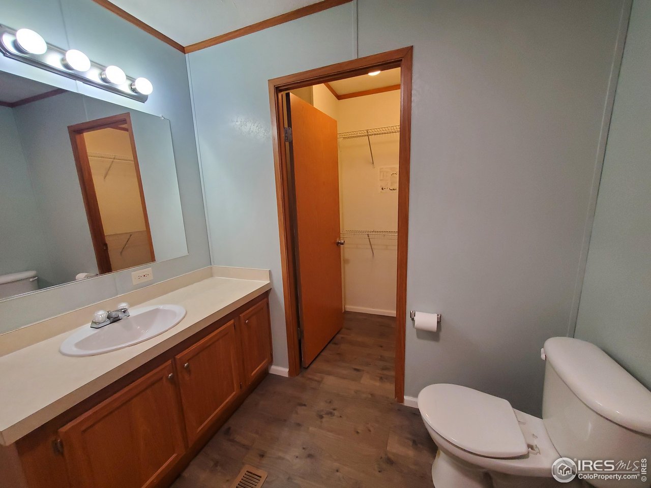 3717 South Taft Hill Road, Unit 285 Fort Collins, CO 80526 - Photo 11 of 18 a bathroom with a granite countertop sink toilet and shower