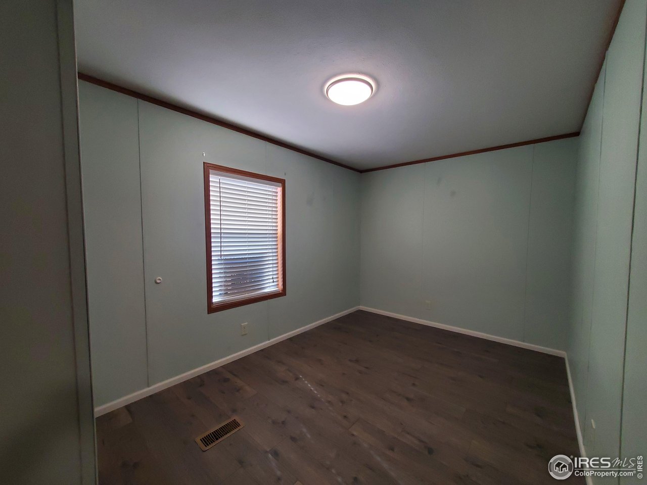 3717 South Taft Hill Road, Unit 285 Fort Collins, CO 80526 - Photo 16 of 18 an empty room with a window