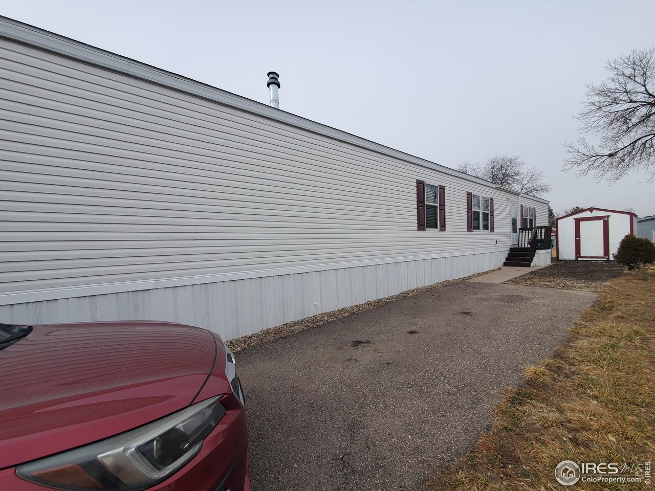 3717 South Taft Hill Road, Unit 285 Fort Collins, CO 80526 - Photo 18 of 18 a view of a two chairs in a room