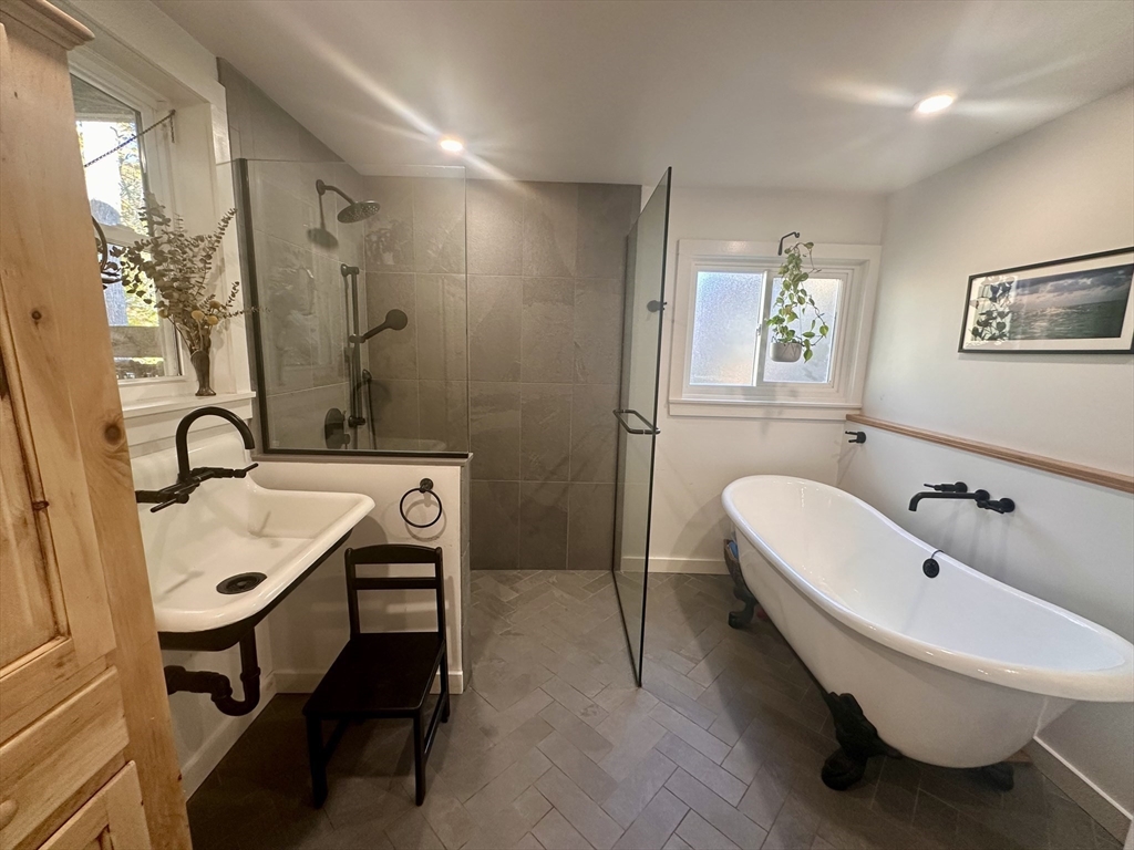 33 William Street Buckland, MA 01370 - Photo 15 of 30 a bathroom with a sink and a bathtub
