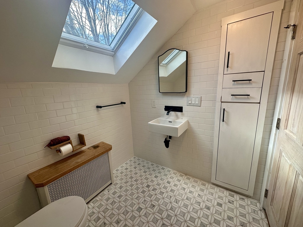 33 William Street Buckland, MA 01370 - Photo 17 of 30 a bathroom with a toilet sink and mirror
