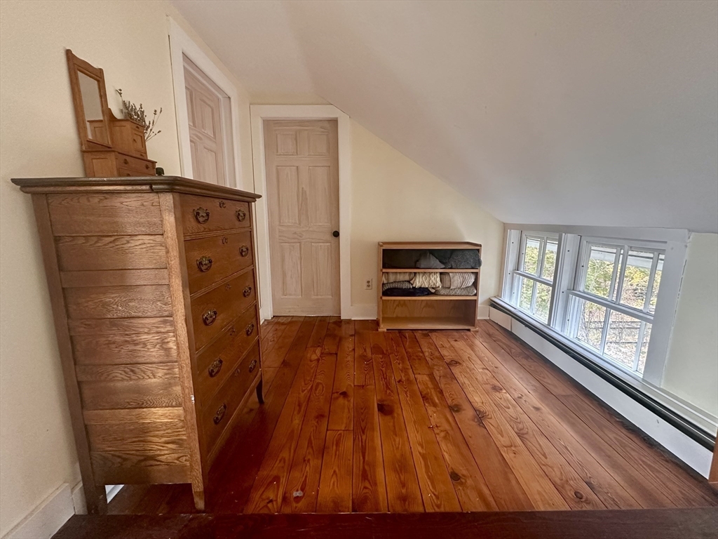 33 William Street Buckland, MA 01370 - Photo 22 of 30 a living room with furniture and a fireplace