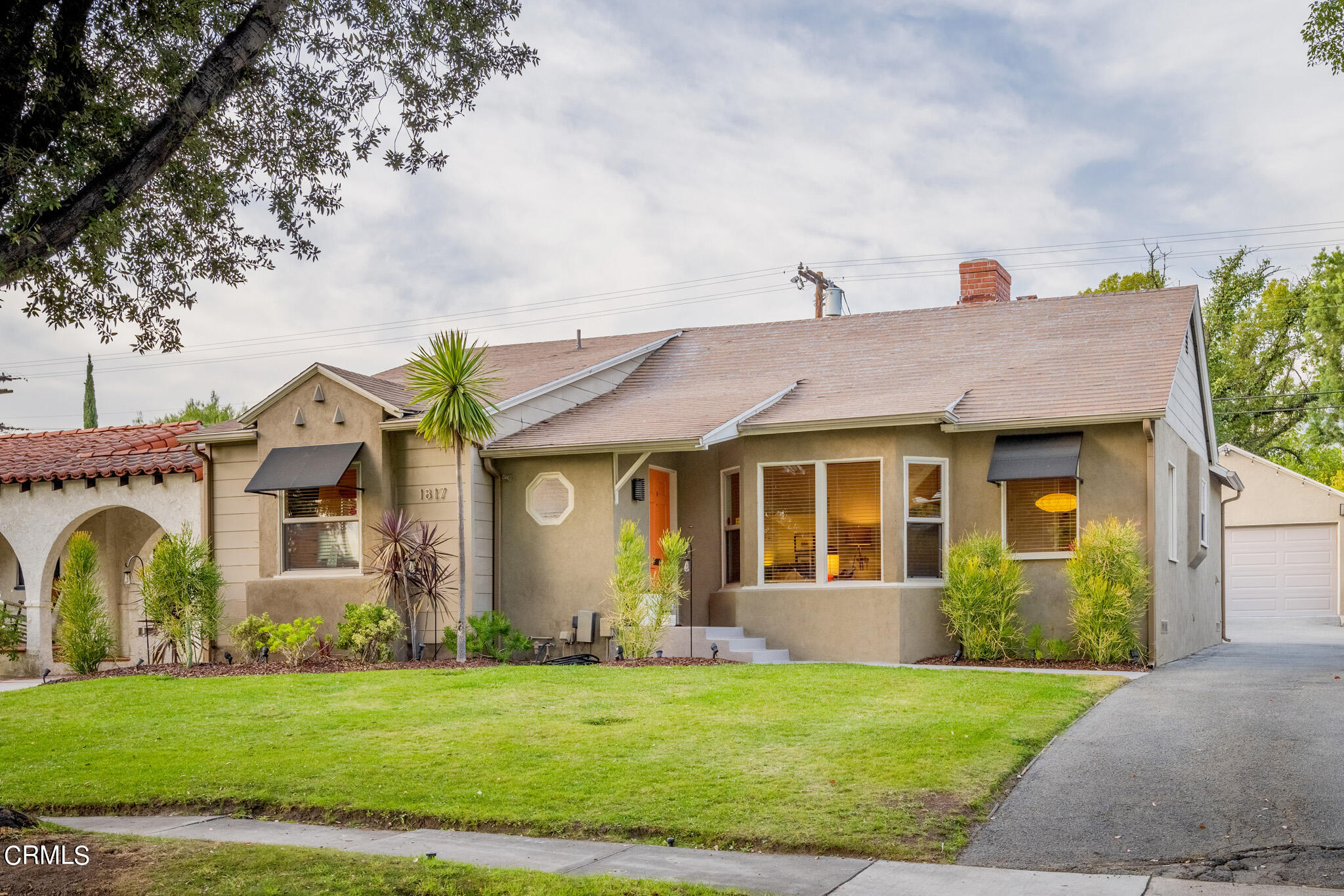 1817 Harmon Place Glendale, CA 91208 - Photo 2 of 45 a front view of a house with a garden