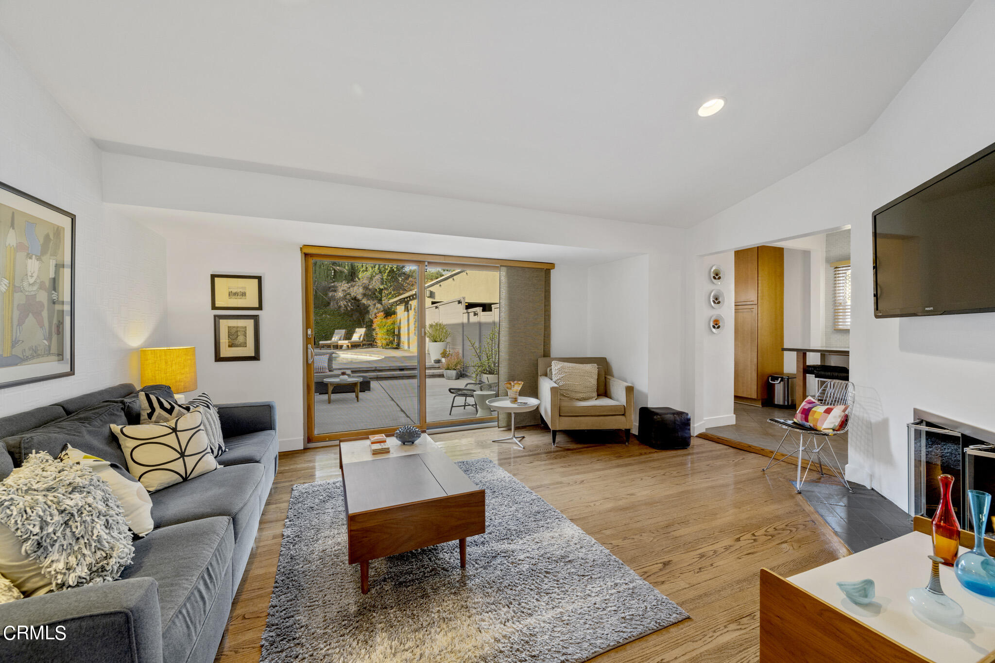 1817 Harmon Place Glendale, CA 91208 - Photo 12 of 45 a living room with furniture and a flat screen tv