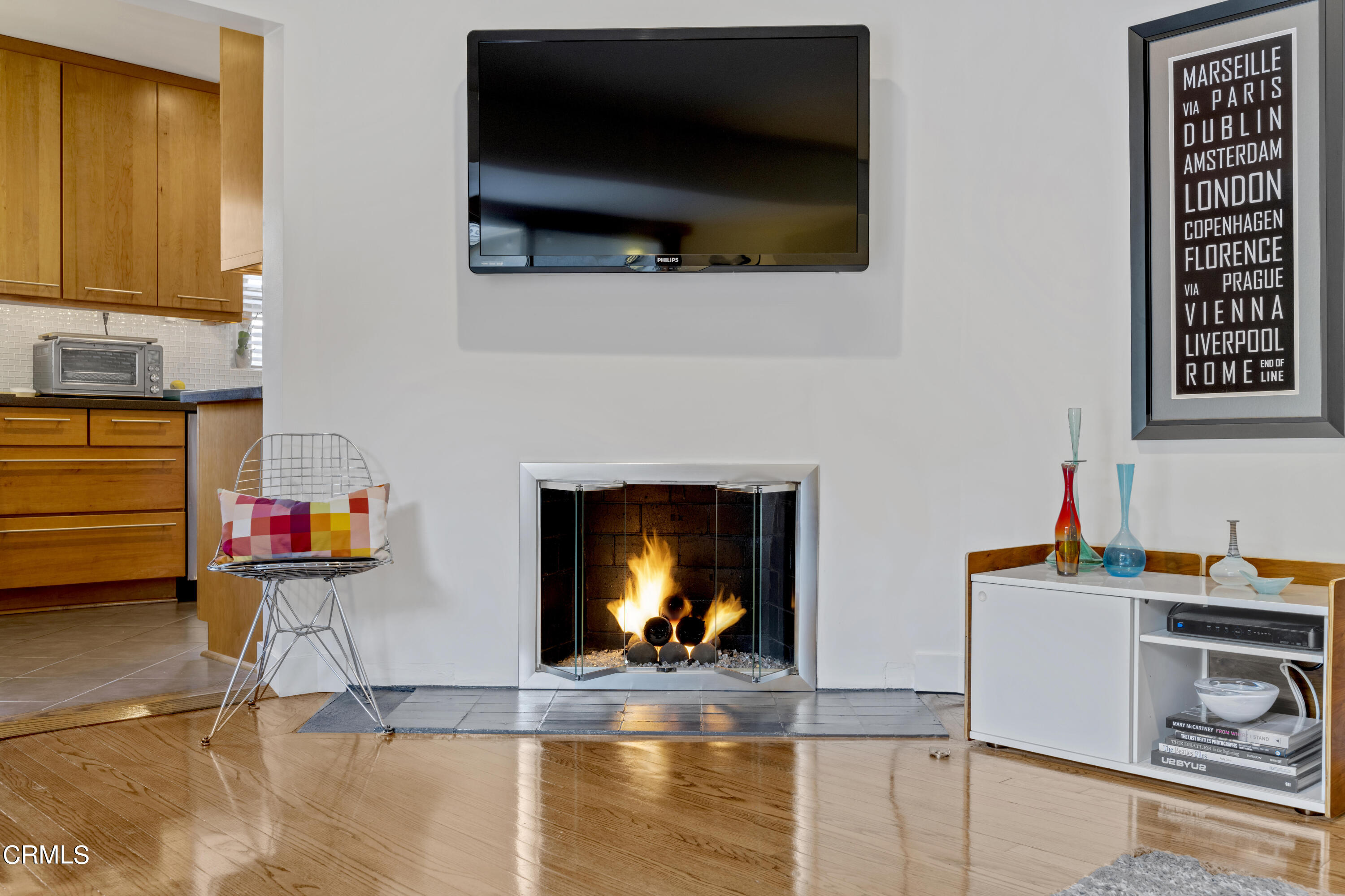 1817 Harmon Place Glendale, CA 91208 - Photo 15 of 45 a living room with furniture and a fireplace or television