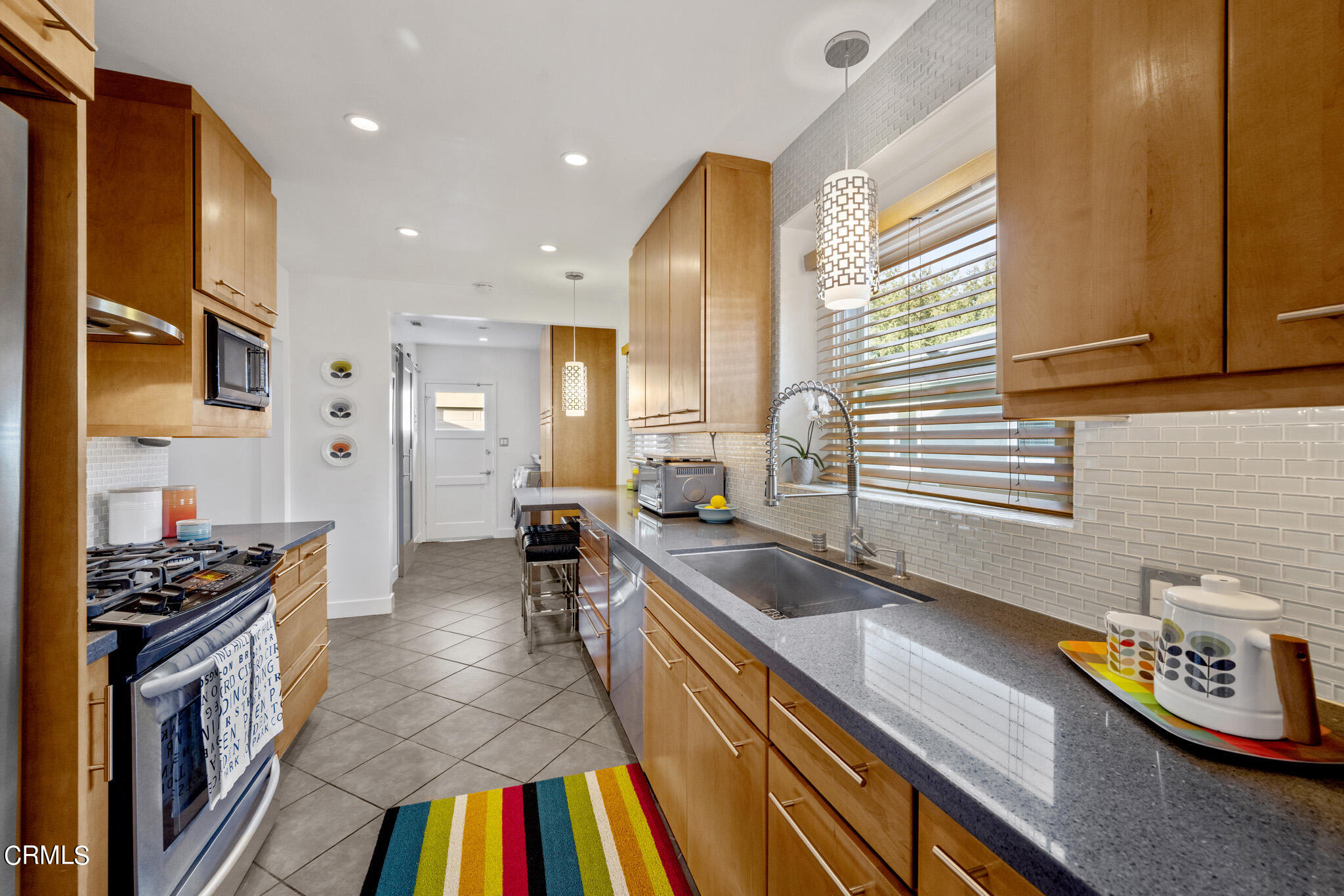 1817 Harmon Place Glendale, CA 91208 - Photo 16 of 45 a kitchen with stainless steel appliances a stove a sink and a refrigerator
