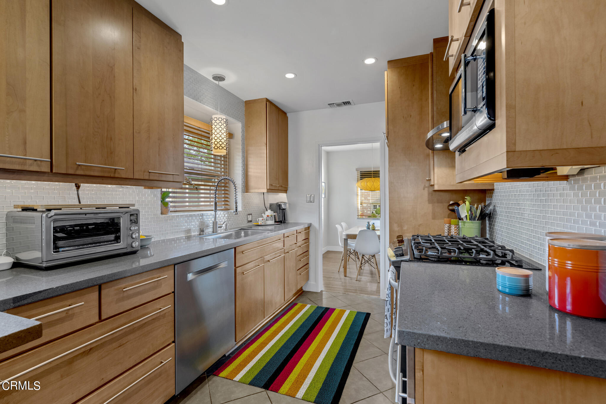 1817 Harmon Place Glendale, CA 91208 - Photo 17 of 45 a kitchen with stainless steel appliances granite countertop a sink stove and cabinets