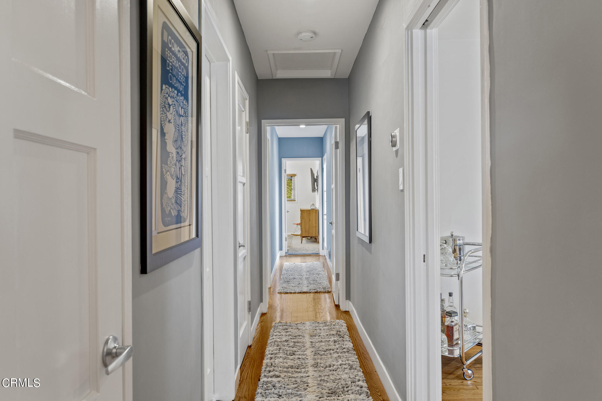 1817 Harmon Place Glendale, CA 91208 - Photo 24 of 45 a view of a hallway with wooden floor and a bathroom