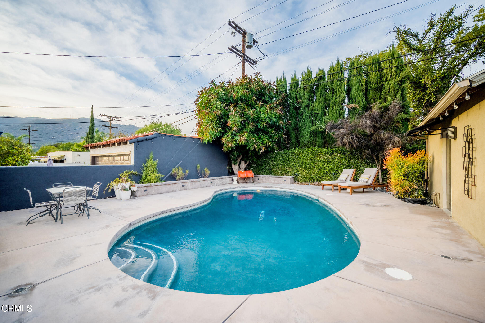 1817 Harmon Place Glendale, CA 91208 - Photo 35 of 45 a view of a swimming pool with a patio