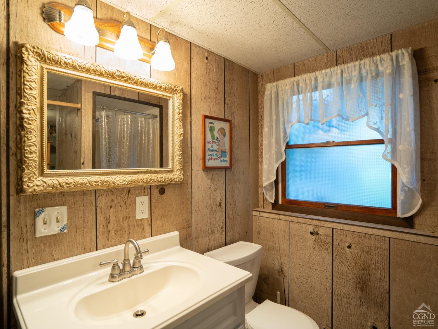 28 Allen Circle Stuyvesant, NY 12106 - Photo 21 of 41 a bathroom with a sink and mirror with toilet