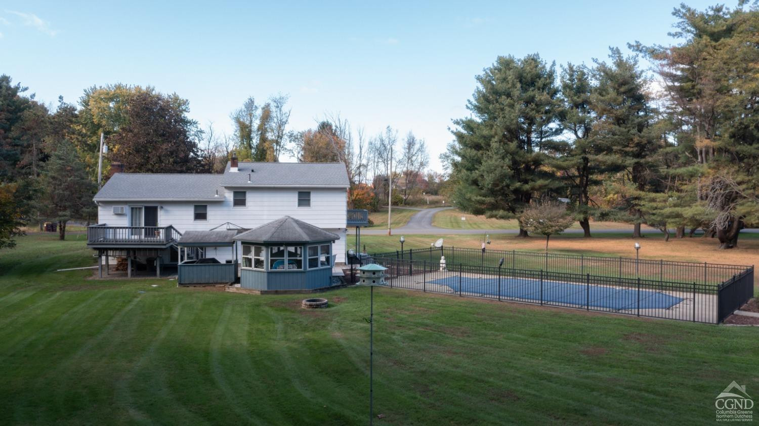 28 Allen Circle Stuyvesant, NY 12106 - Photo 36 of 41 a view of a house with a yard porch and sitting area