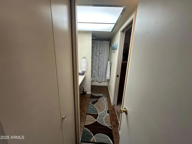 a view of hallway with stairs