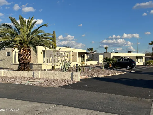 a view of a very nice looking building with a road