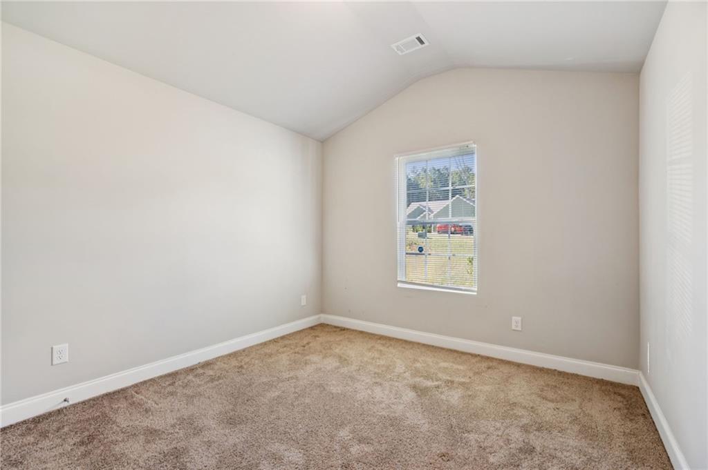 224 Katie Lane Commerce, GA 30529 - Photo 24 of 35 an empty room with a window