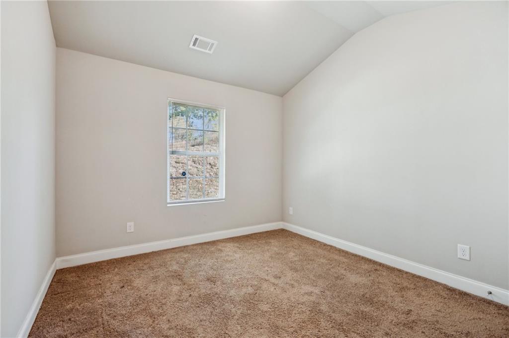 224 Katie Lane Commerce, GA 30529 - Photo 25 of 35 an empty room with a window