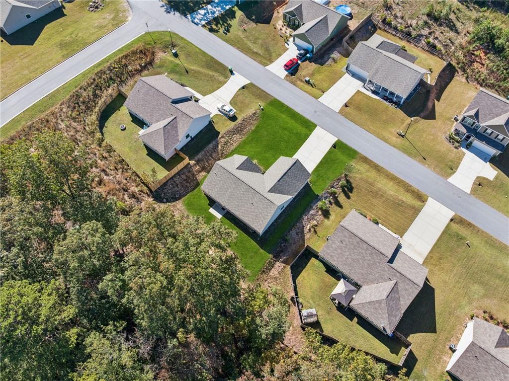 224 Katie Lane Commerce, GA 30529 - Photo 33 of 35 an aerial view of a house with a swimming pool