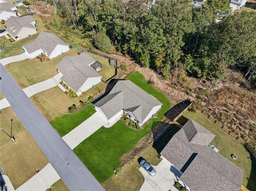 224 Katie Lane Commerce, GA 30529 - Photo 7 of 35 an aerial view of a house with a garden