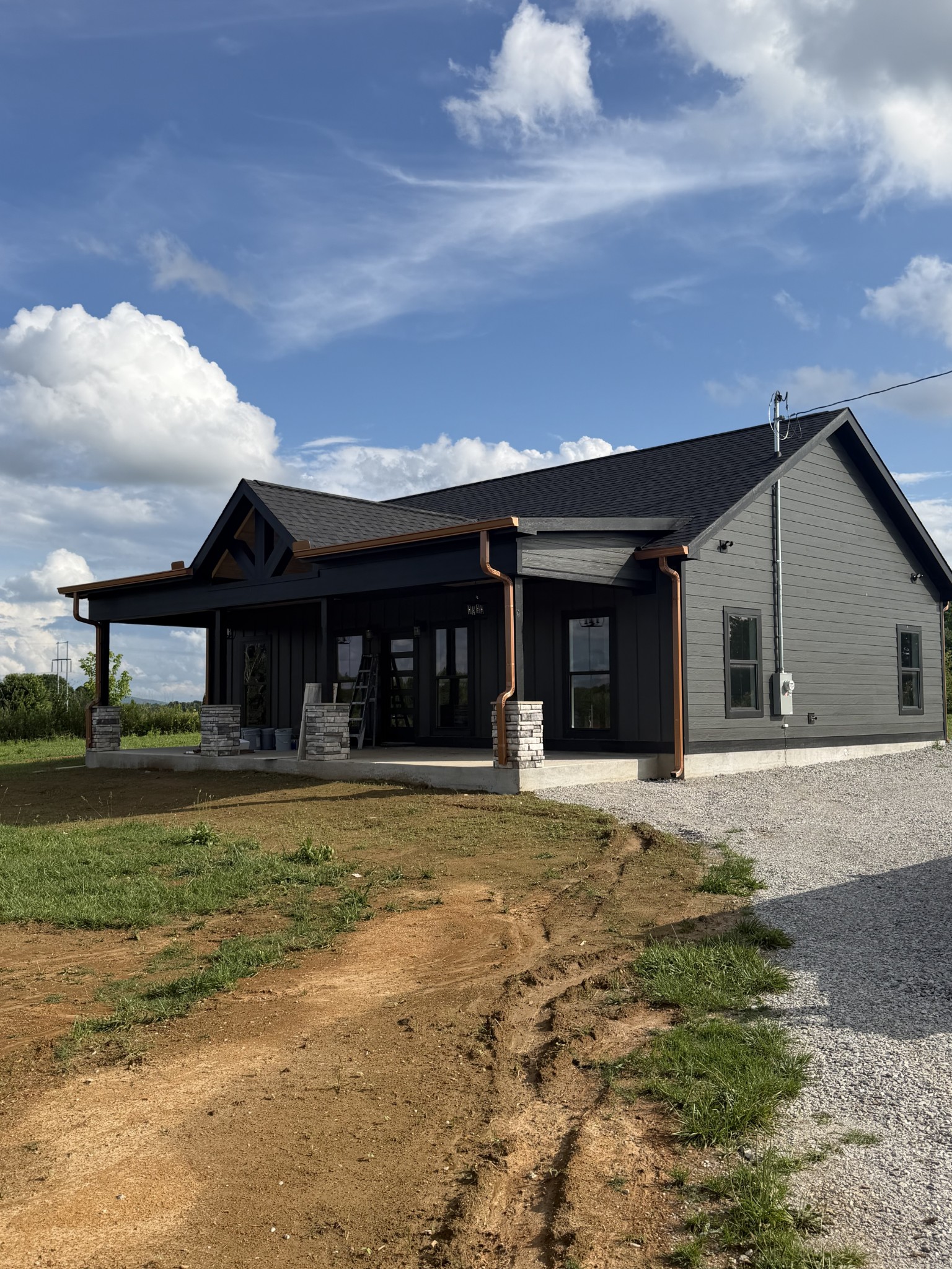 4901 Old Salem Lexie Road Belvidere, TN 37306 - Photo 1 of 12 a front view of a house with a garden