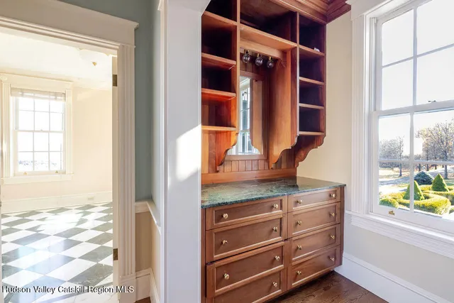 a view of dresser and window