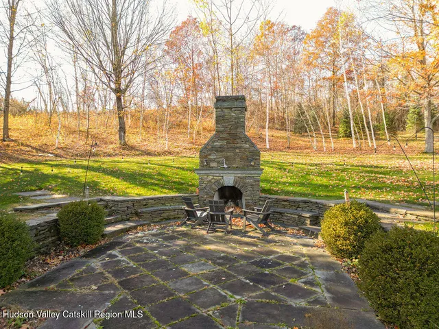 a view of a lake with houses in the back