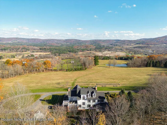 a view of an ocean and a mountain
