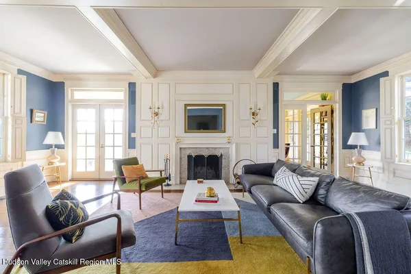 a living room with furniture or couch and a fireplace