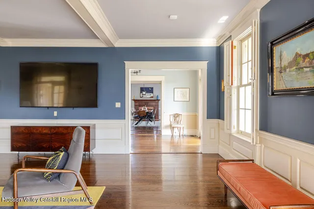 a lobby with furniture and window