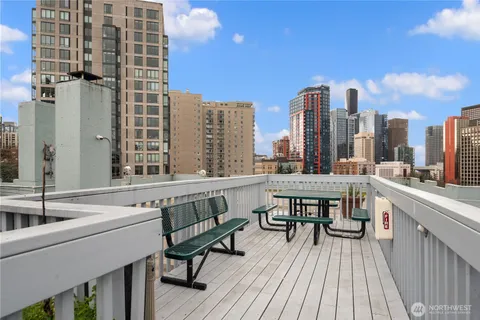 a view of roof deck with patio