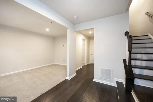 a view of entryway with wooden floor
