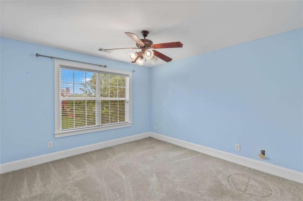 4201 Donington Way Hampton, GA 30228 - Photo 23 of 43 a view of an empty room with a window