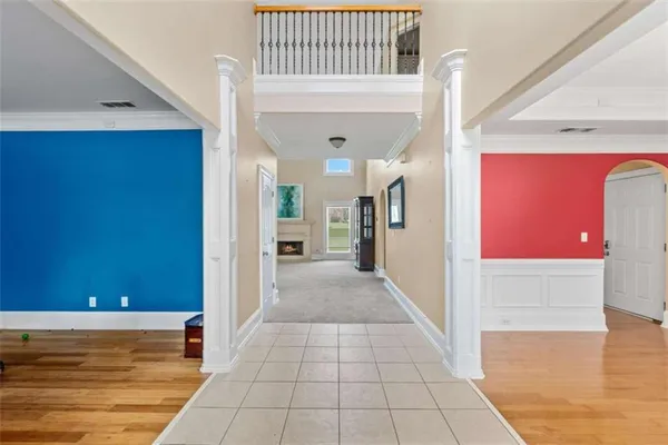 a view of a hallway with a living room
